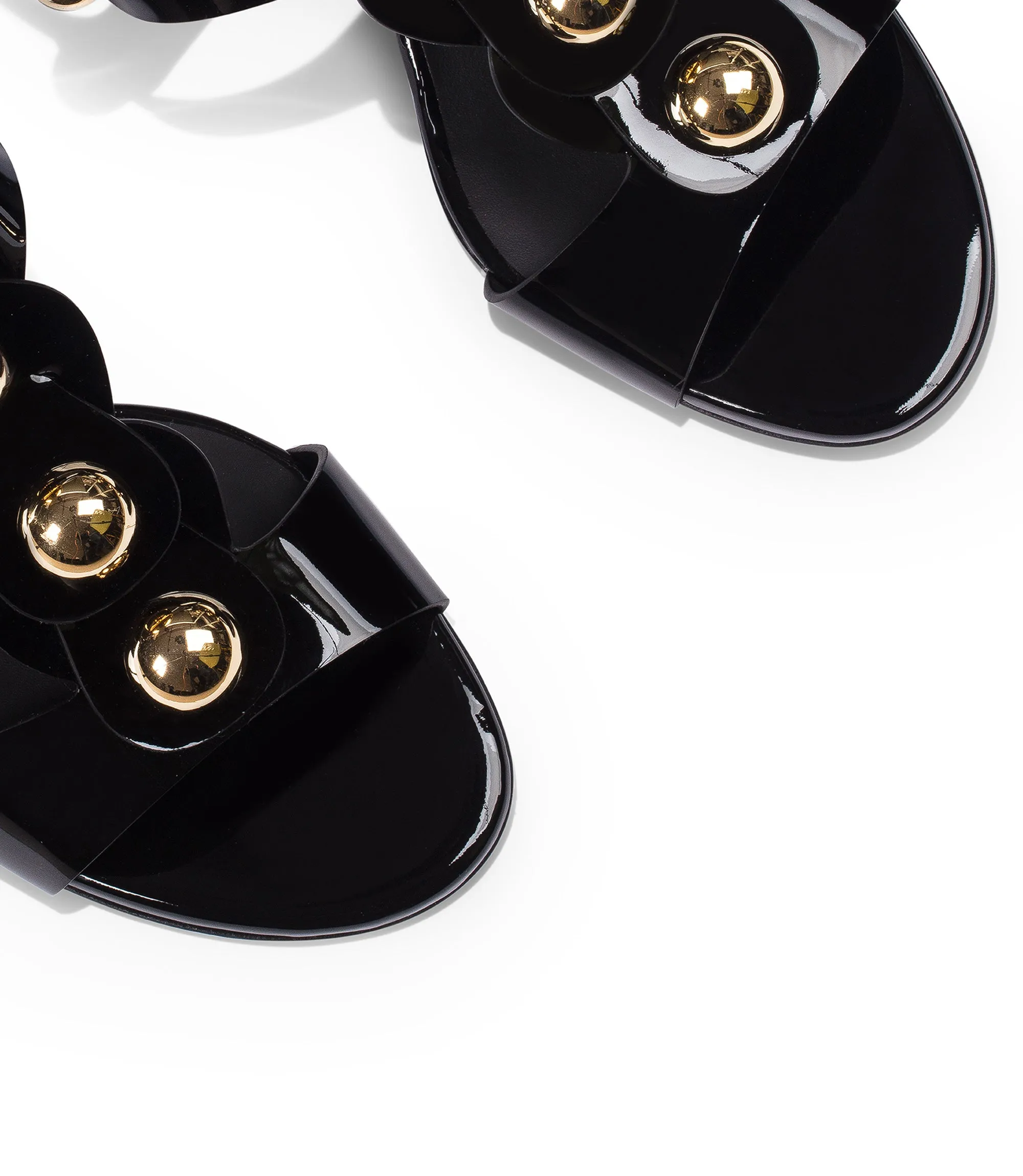 Black studded patent leather sandals