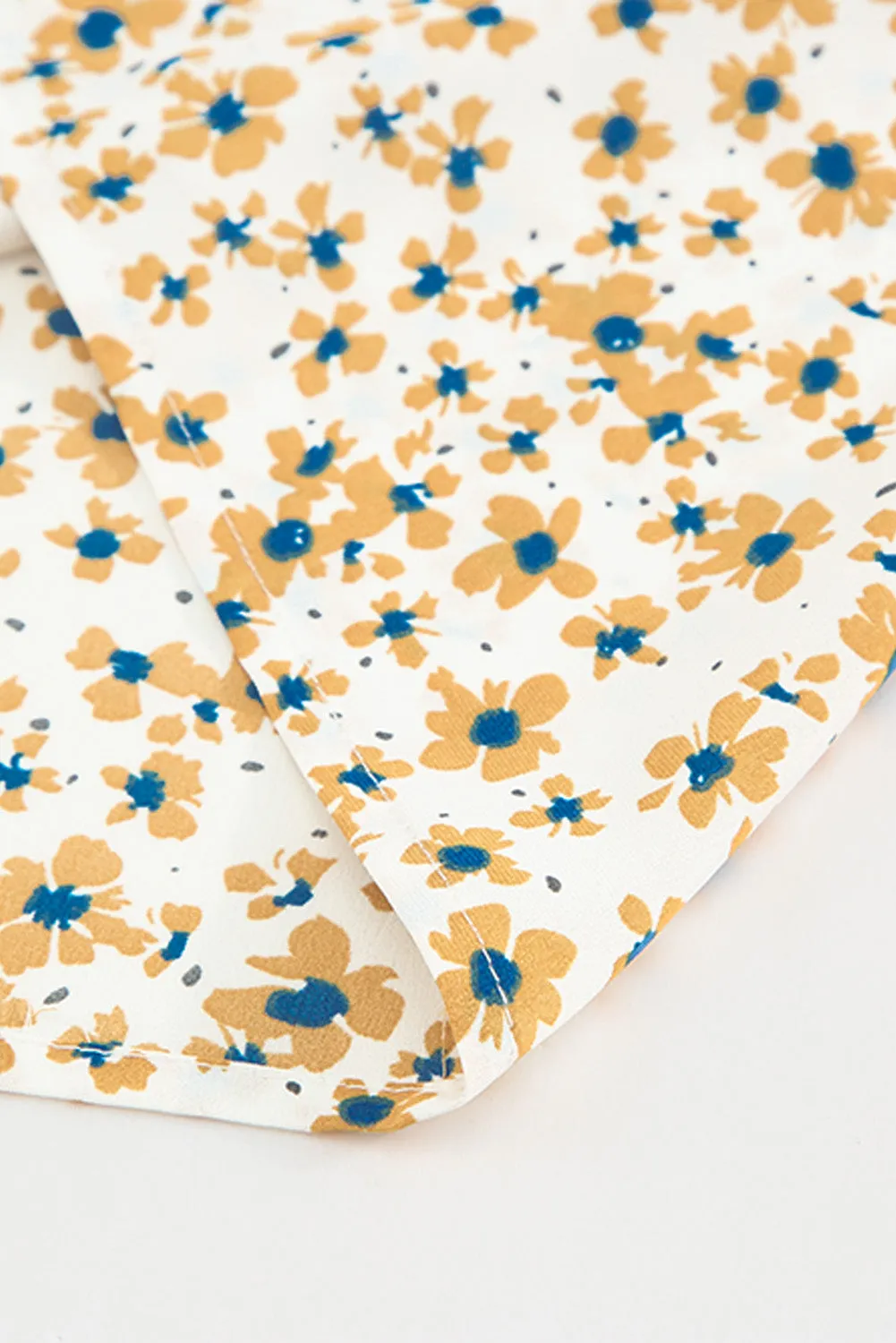 Daisy Print Smocked Ruffled V Neck Shirt