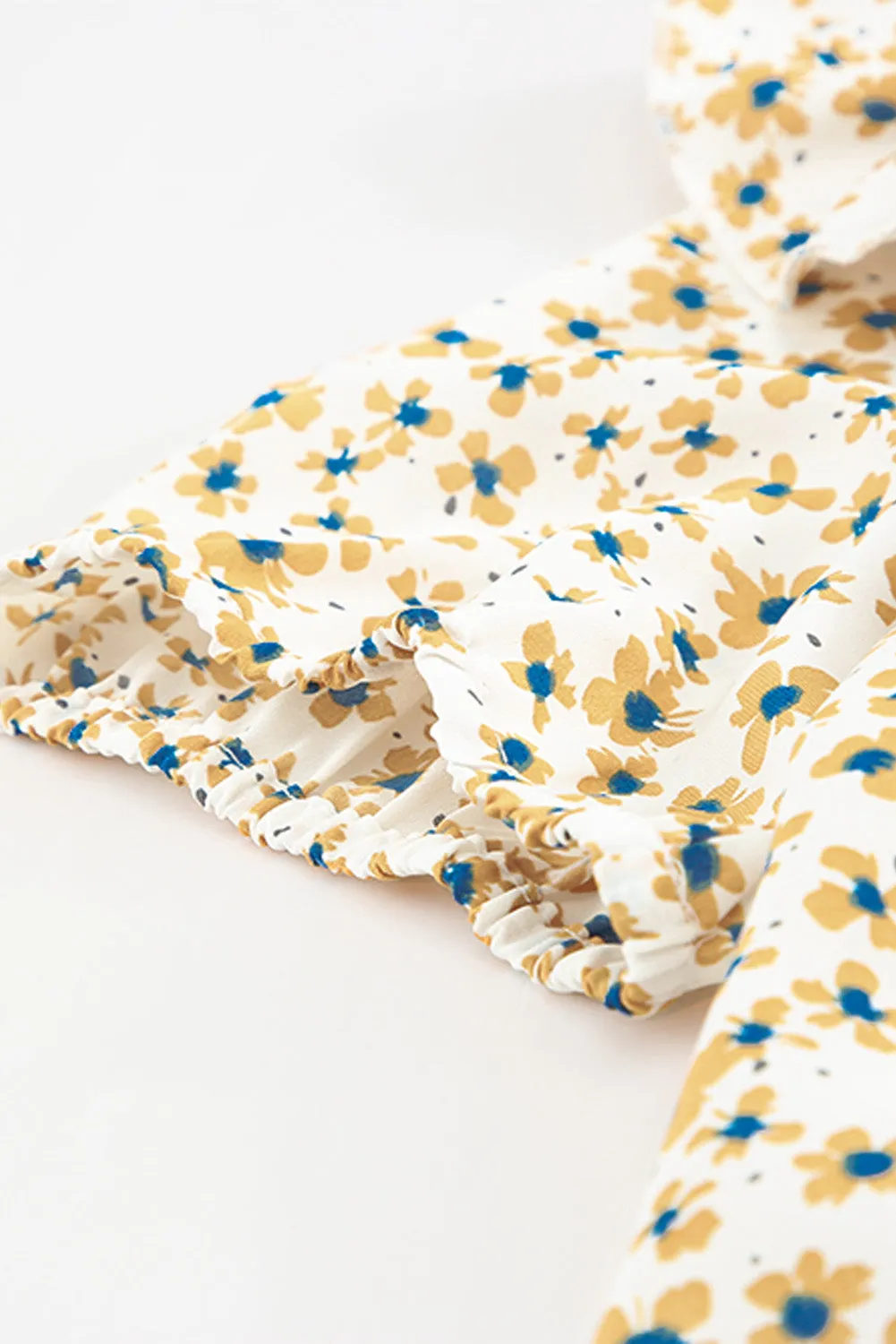 Daisy Print Smocked Ruffled V Neck Shirt